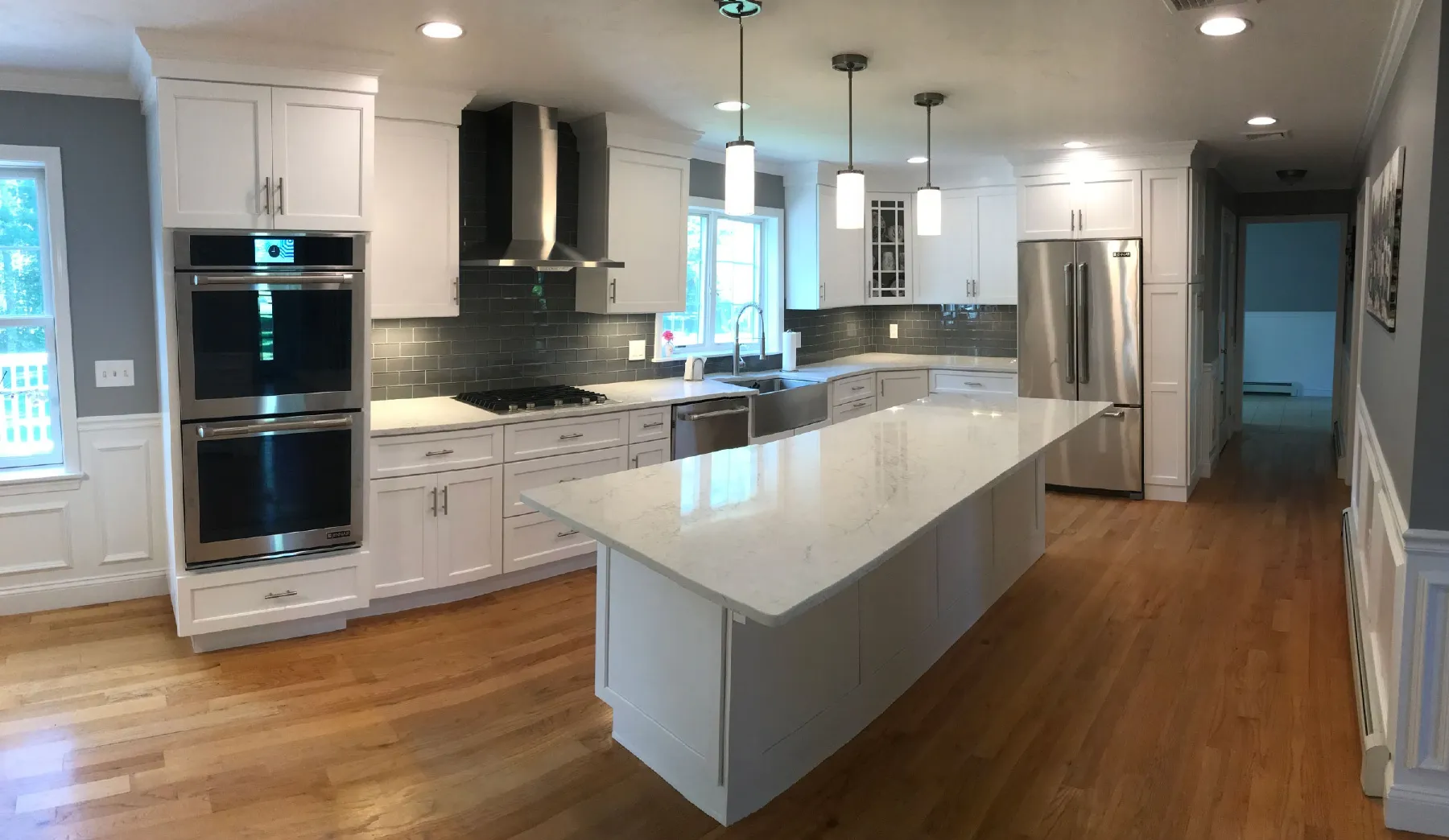A beautiful kitchen with a spacious flow and comfortable island focal point